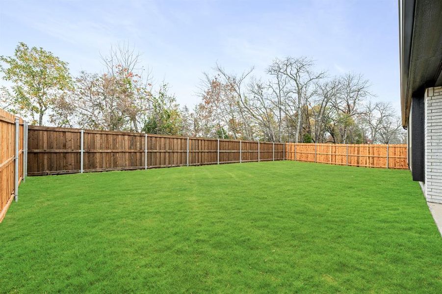 Exterior details and patio area of a home in East Oak Creek 60-65, Commerce (Image 4). Exterior details and patio area of a home in East Oak Creek 60-65, Commerce (Image 4).