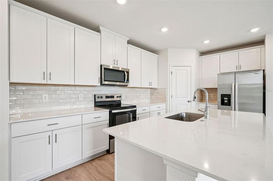 Furnished interior view inside a new home in The Reserve at Hammock Oaks - Signature Series, Lady Lake (Image 5).