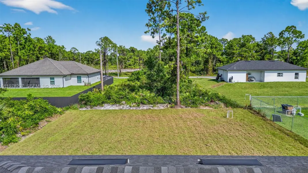 Exterior details and patio area of a home in , Lehigh Acres (Image 3).