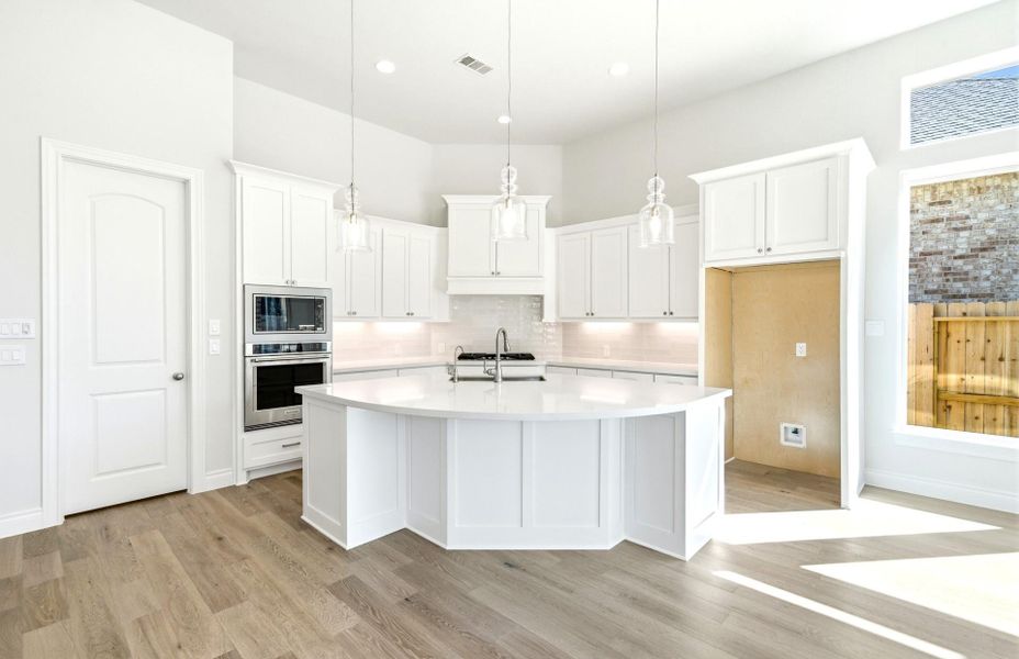 Furnished interior view inside a new home in The Highlands 55′, Porter (Image 9).