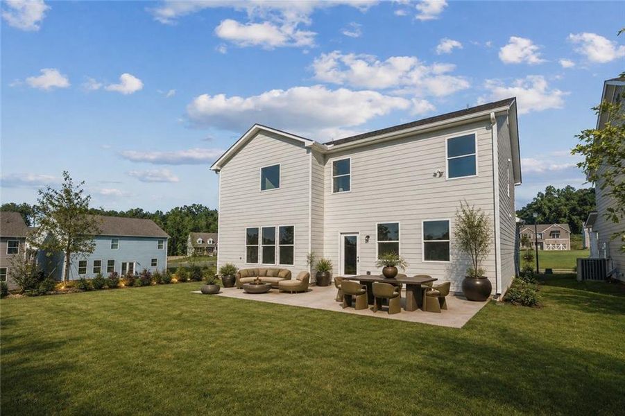 Exterior details and patio area of a home in Clark Farms, Flowery Branch (Image 22).