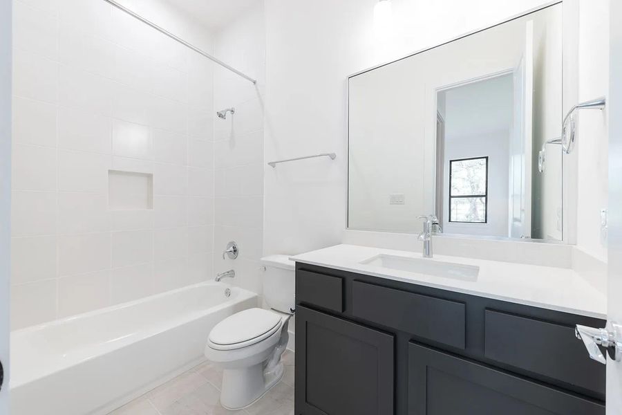 Furnished interior view inside a new home in Caliterra - 110', Dripping Springs (Image 5). Furnished interior view inside a new home in Caliterra - 110', Dripping Springs (Image 5).