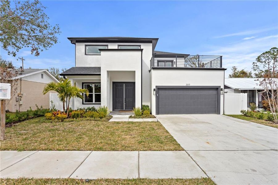 Front exterior of a new home in , Tampa, FL, highlighting curb appeal (Image 34). Front exterior of a new home in , Tampa, FL, highlighting curb appeal (Image 34).