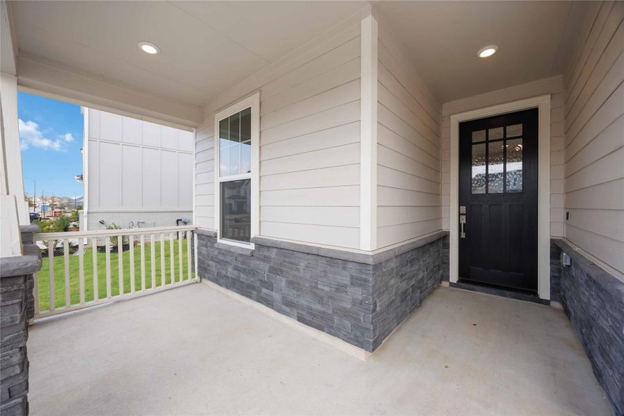Exterior details and patio area of a home in Elyson, Katy (Image 22).