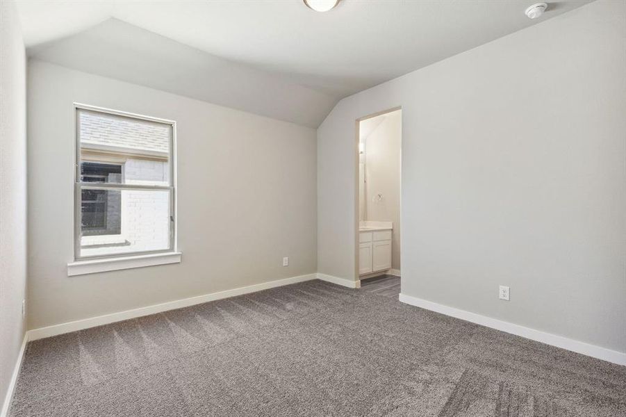 Bedroom in the Morrison home plan by Trophy Signature Homes – REPRESENTATIVE PHOTO Bedroom in the Morrison home plan by Trophy Signature Homes – REPRESENTATIVE PHOTO