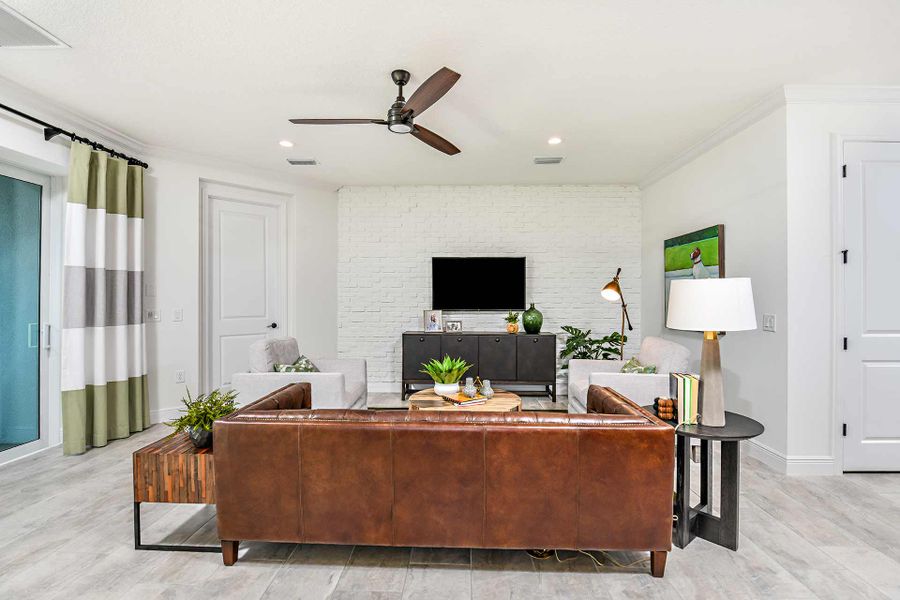 Representative furnished interior of a home built from the Triumph by Neal Communities in Verandah, Fort Myers (Image 14).