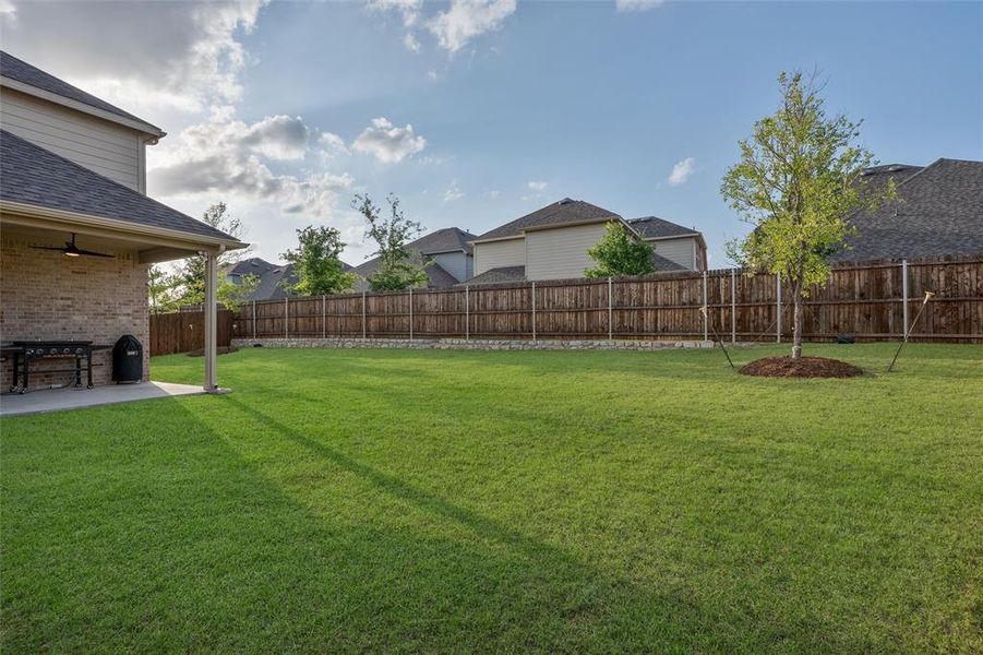 Exterior details and patio area of a home in Erwin Farms, McKinney (Image 4).