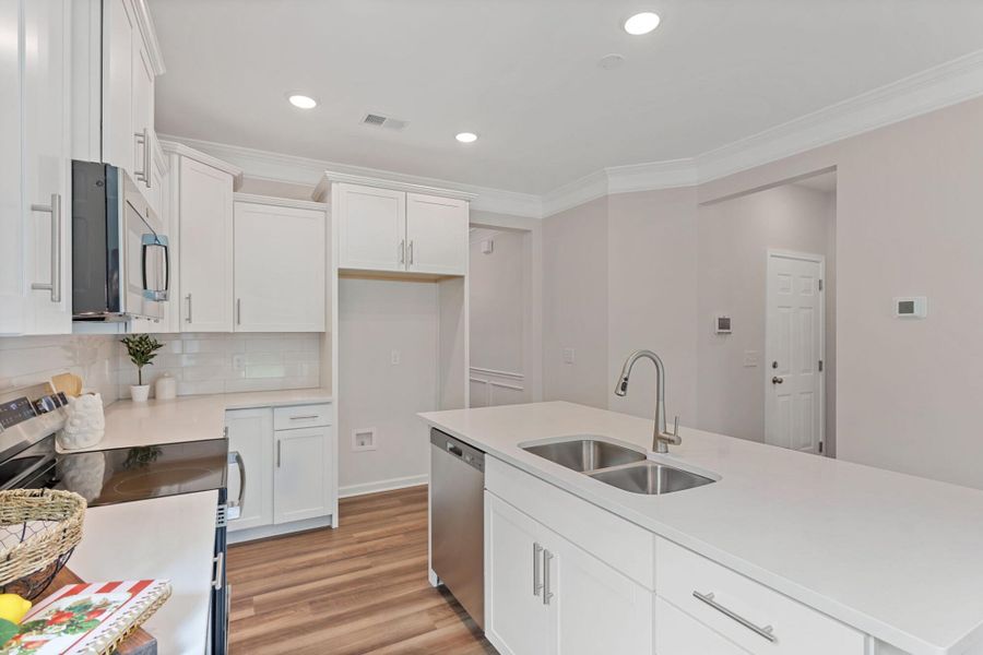Furnished interior view inside a new home in East Main Townes, Spartanburg (Image 10). Furnished interior view inside a new home in East Main Townes, Spartanburg (Image 10).
