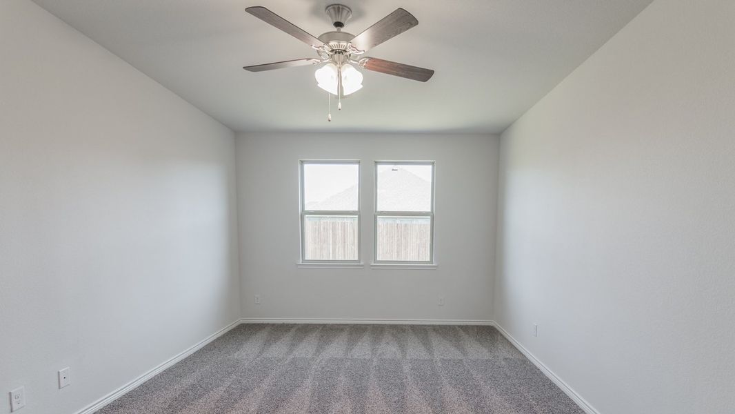 Representative unfurnished interior of a home built from the Medbourne by D.R. Horton in Woodcreek, Fate (Image 10).