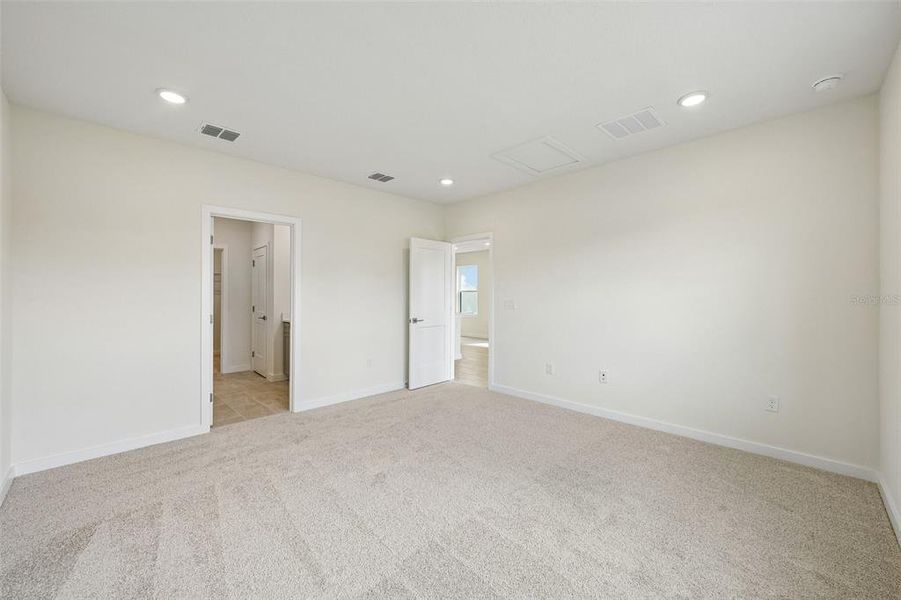 Spacious, unfurnished interior of a new home in Grasslands West, Lakeland (Image 35).