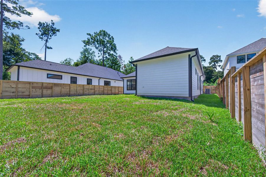 Exterior details and patio area of a home in , Conroe (Image 4).