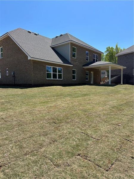Exterior details and patio area of a home in Mirror Lake at South Harbour, Villa Rica (Image 30).