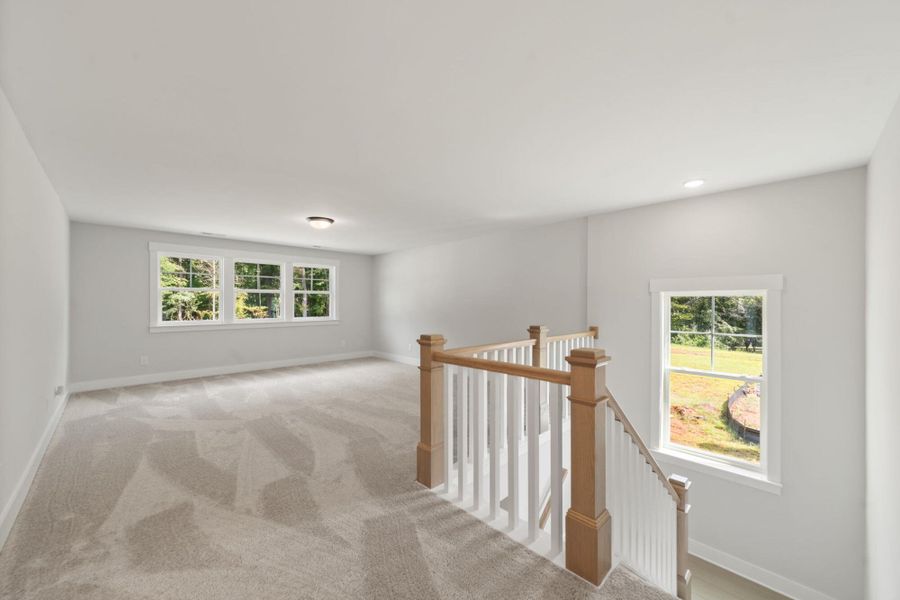 Spacious, unfurnished interior of a new home in Fiddler's Ridge, Advance (Image 22).