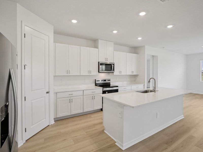 Furnished interior view inside a new home in Coasterra - Reserve Series, Palmetto (Image 3).