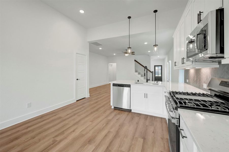 Furnished interior view inside a new home in Marvida, Cypress (Image 19).