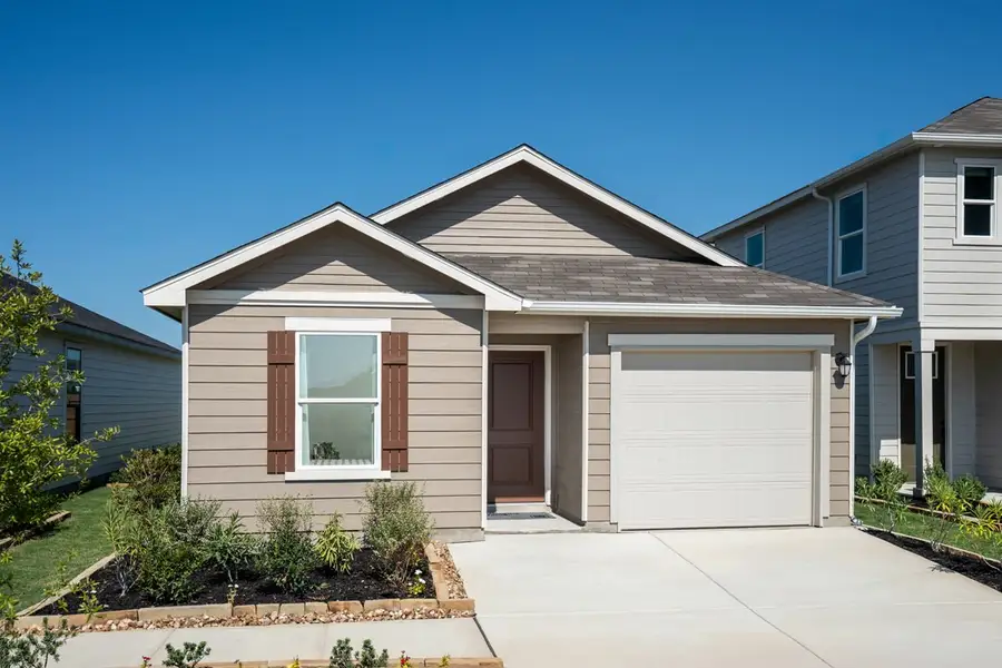 Representative exterior photo of a completed home built from the Plan 1245 Modeled by KB Home in Medina Crossing - Villa Collection, Von Ormy, TX (Image 9). Representative exterior photo of a completed home built from the Plan 1245 Modeled by KB Home in Medina Crossing - Villa Collection, Von Ormy, TX (Image 9).