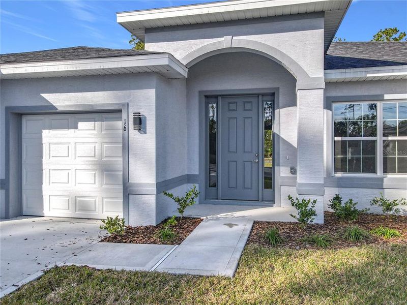 Exterior details and patio area of a home in , Palm Coast (Image 4). Exterior details and patio area of a home in , Palm Coast (Image 4).