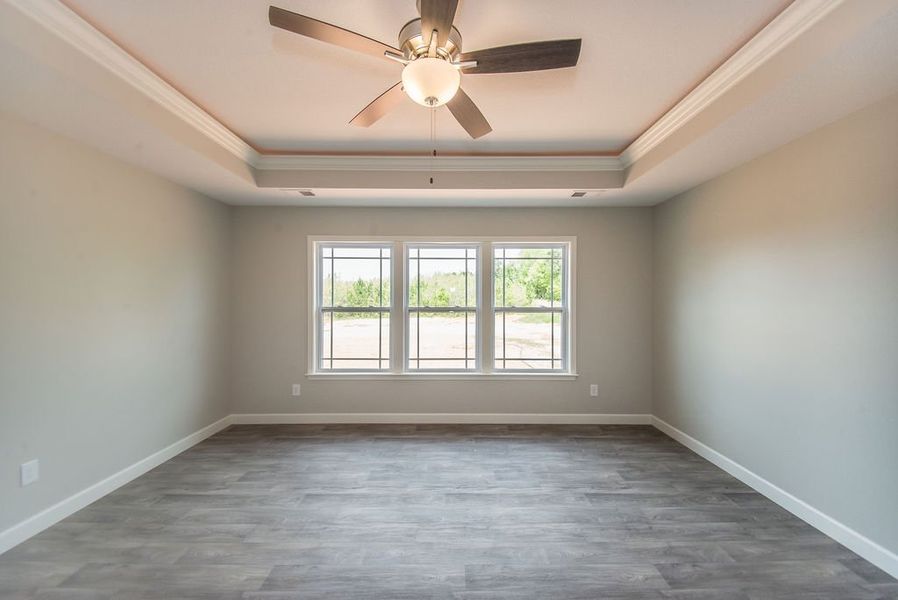 Representative unfurnished interior of a home built from the Beaumont by Enchanted Homes in Guadalupe Heights, Seguin (Image 52).
