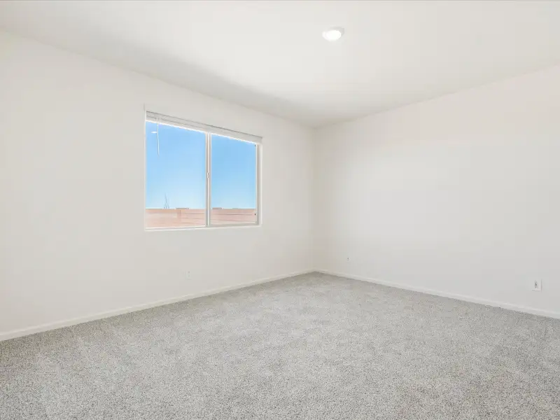 Spacious, unfurnished interior of a new home in Las Patrias at Star Valley Phase III - Signature Series, Tucson (Image 10).