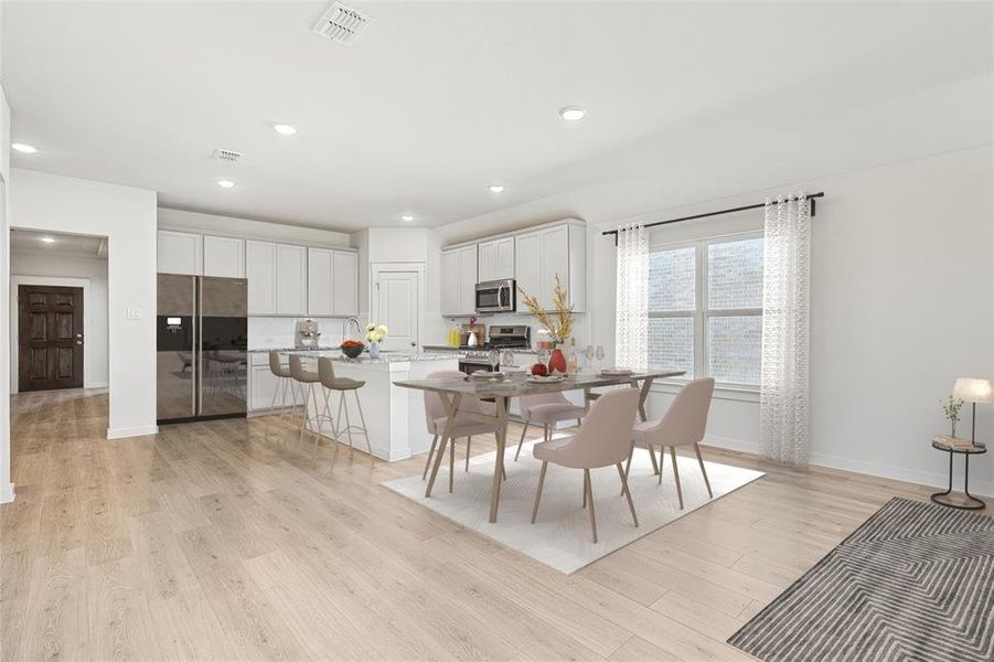 Dining room featuring light hardwood / wood-style floors