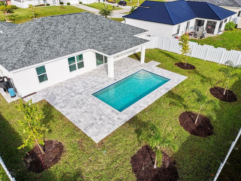 Representative exterior details of a home built from the The Sunset Harbor with Pool by Sunlife Homes LLC in Cape Coral, Cape Coral (Image 29). Representative exterior details of a home built from the The Sunset Harbor with Pool by Sunlife Homes LLC in Cape Coral, Cape Coral (Image 29).