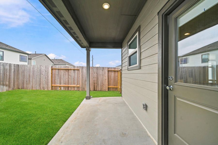Exterior details and patio area of a home in Mason Woods, Cypress (Image 4). Exterior details and patio area of a home in Mason Woods, Cypress (Image 4).