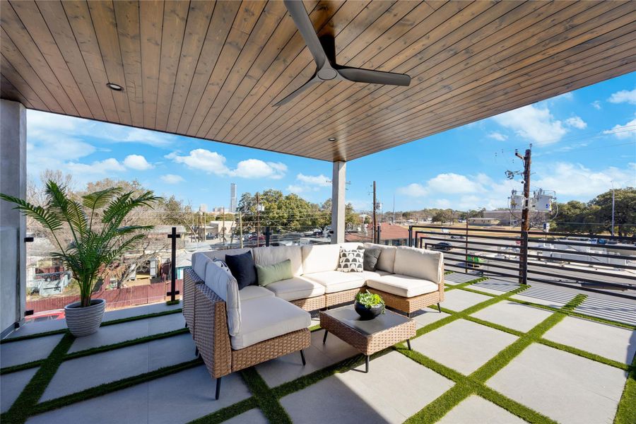 View of patio with an outdoor living space- sunrises, sunsets, and city skyline views