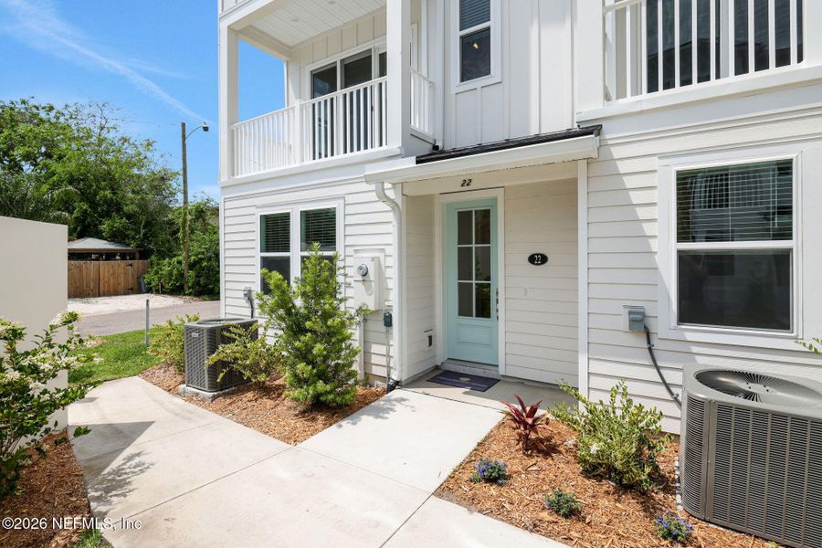 Exterior details and patio area of a home in North Beach Townhomes, Jacksonville Beach (Image 20).