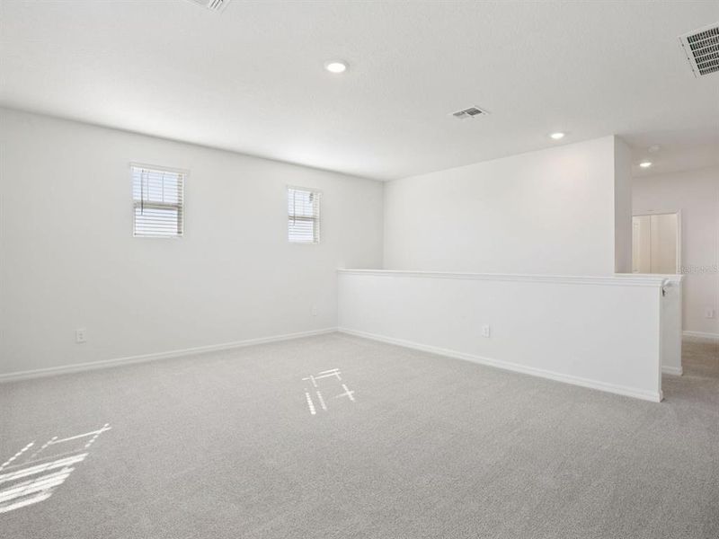 Spacious, unfurnished interior of a new home in Coasterra - Reserve Series, Palmetto (Image 25).