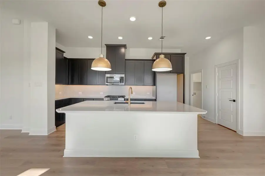 Furnished interior view inside a new home in Creekshaw – Classic, Royse City (Image 5).