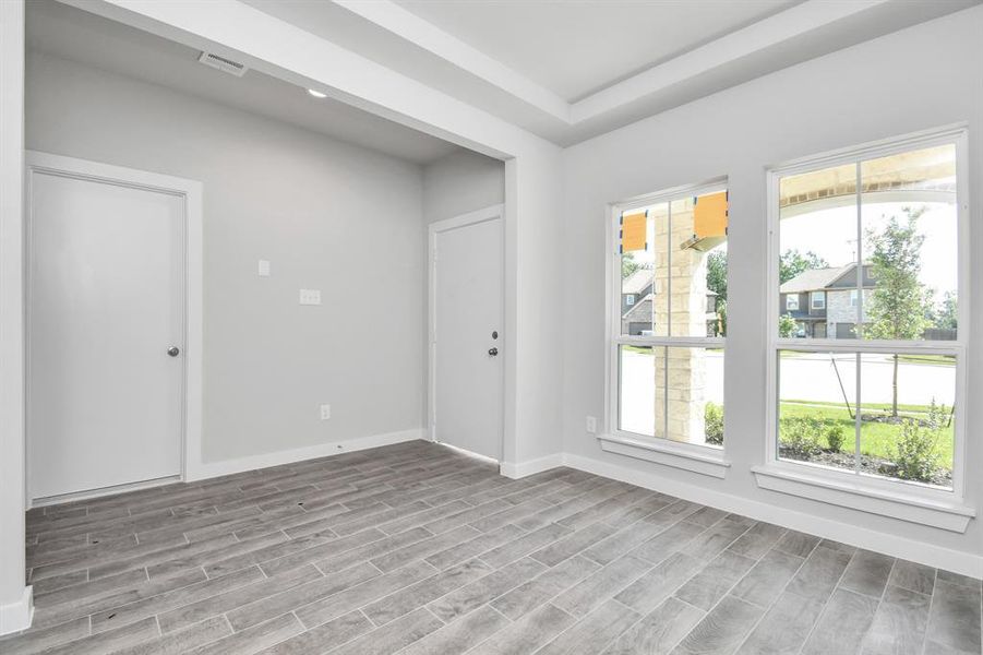 Another view of dining space. Sample photo of completed home with similar floor plan. As-built interior colors and selections may vary.