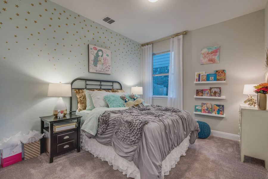 Representative furnished interior of a home built from the Asher by Chesmar Homes in Buffalo Crossing, Cibolo (Image 21).