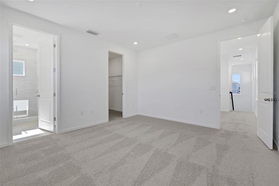 Spacious, unfurnished interior of a new home in Serenade at Ovation, Winter Garden (Image 27).