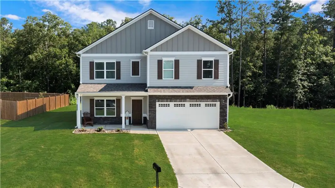 Front exterior of a new home in , Rome, GA, highlighting curb appeal (Image 1). Front exterior of a new home in , Rome, GA, highlighting curb appeal (Image 1).
