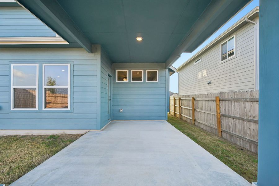 Exterior details and patio area of a home in Whisper Valley, Manor (Image 16).