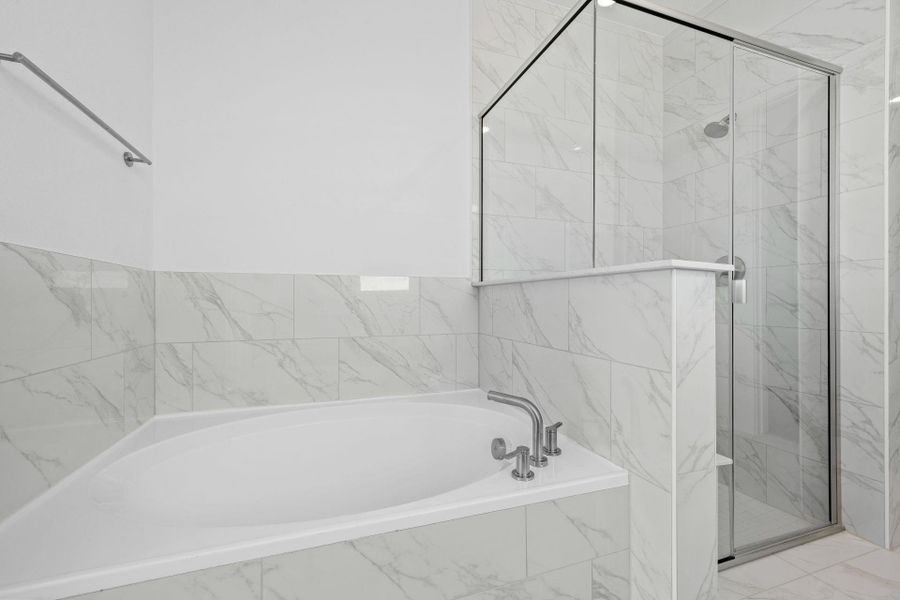 Primary Bath retreat with garden tub & walk-in shower Primary Bath retreat with garden tub & walk-in shower