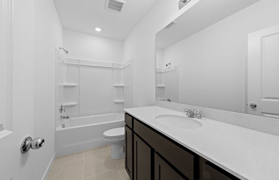 Furnished interior view inside a new home in Caloosa Cove, Labelle (Image 8).