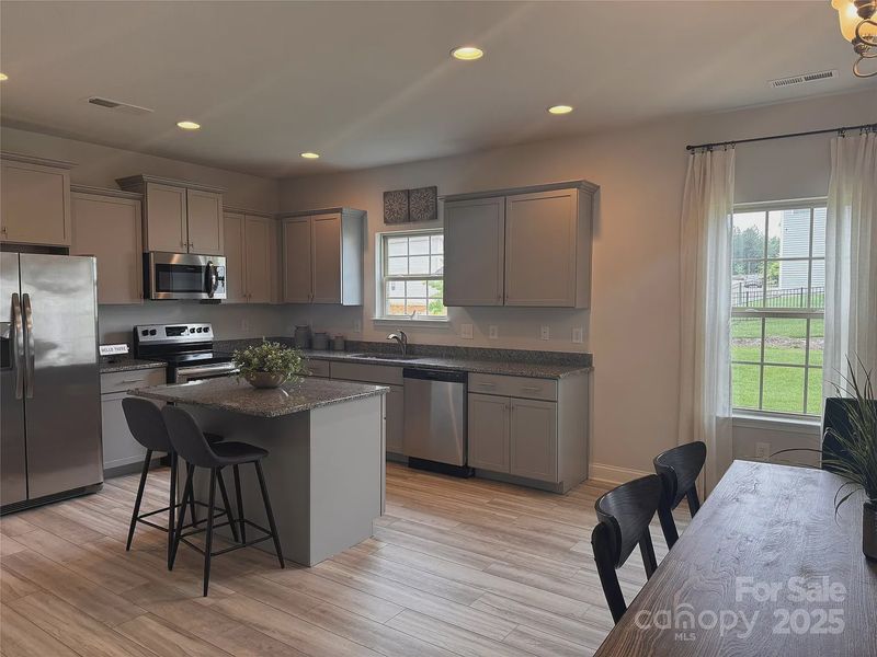 Furnished interior view inside a new home in Village at Parkside, Gastonia (Image 10).