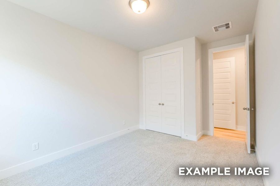 Spacious, unfurnished interior of a new home in Sunterra, Katy (Image 26).