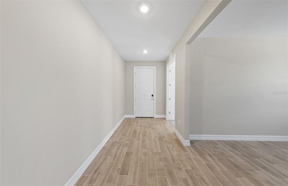 Spacious, unfurnished interior of a new home in The Strand at Cedar Grove, North Port (Image 23).