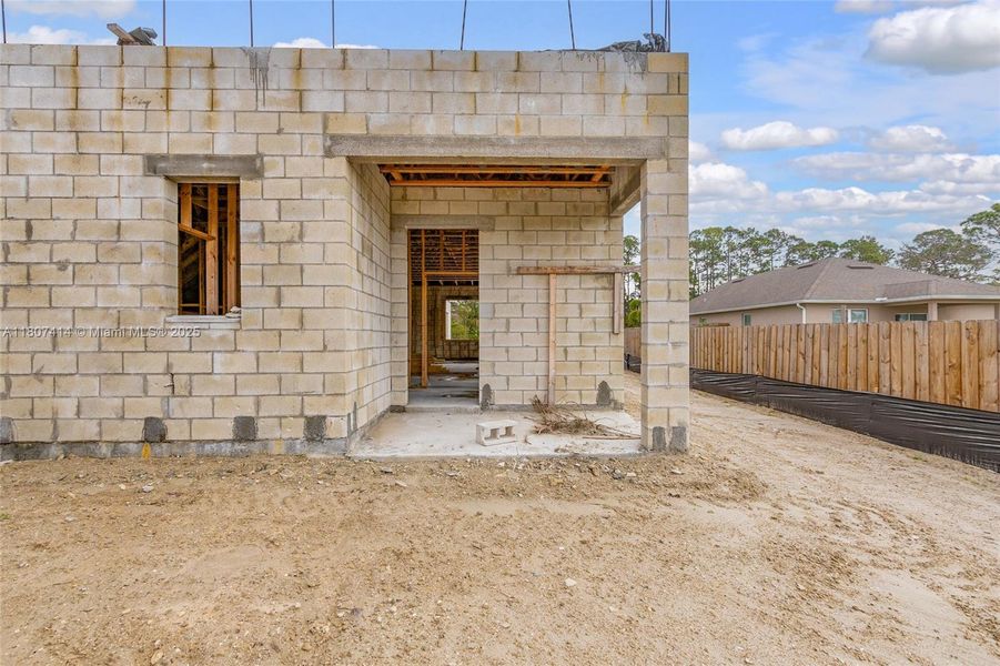 Front exterior of a new home in , Palm Bay, FL, highlighting curb appeal (Image 14).