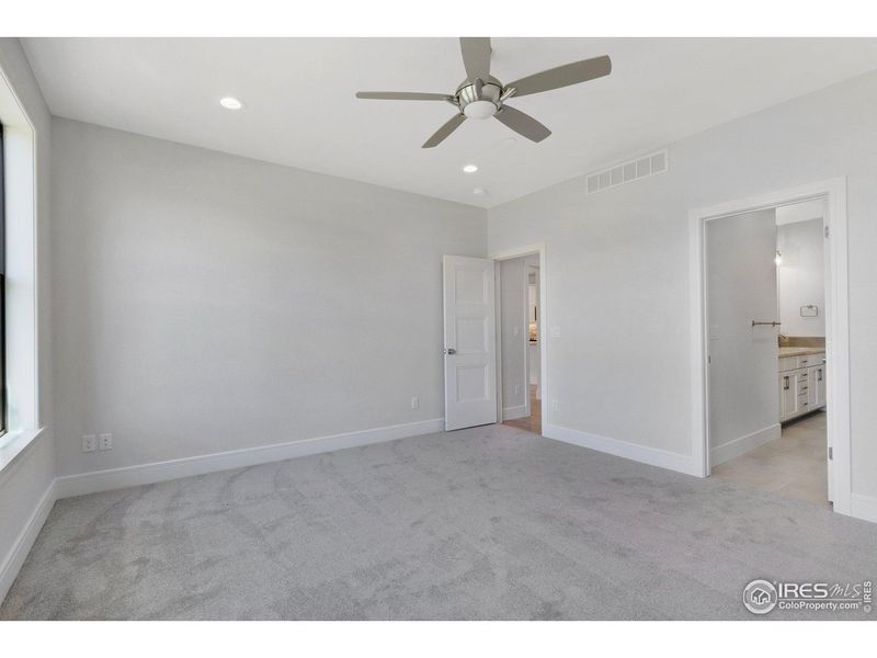 Spacious, unfurnished interior of a new home in Cottages at Kelly Farm, Greeley (Image 22).
