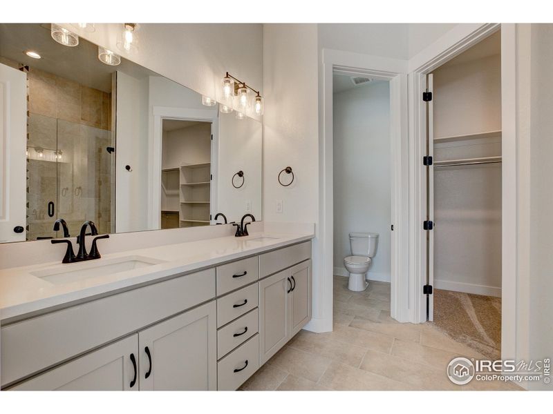 Primary Bath w/ dual vanity and ample counterspace