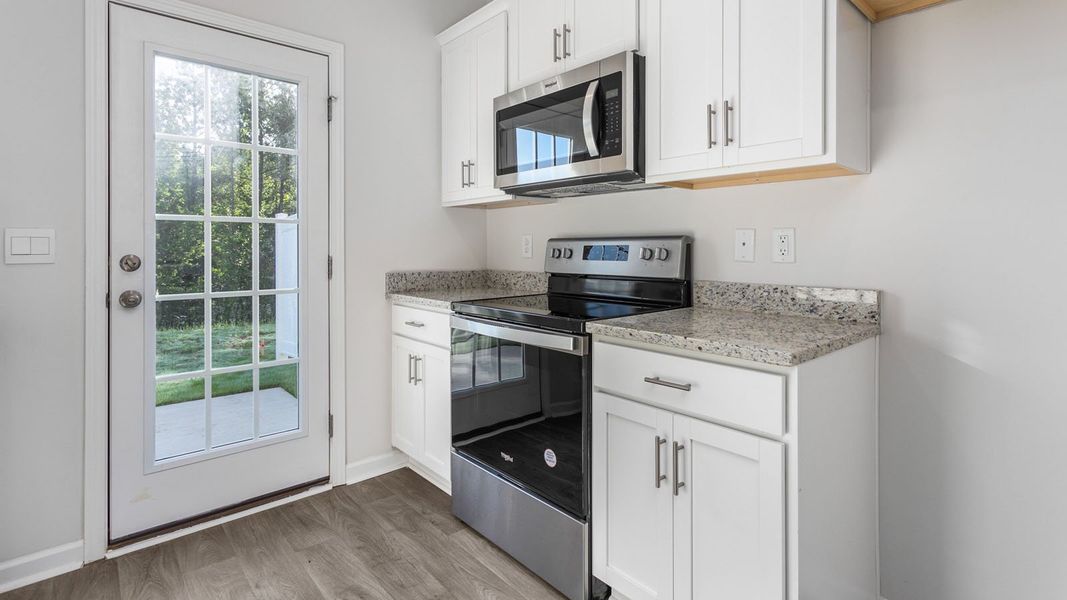 Furnished interior view inside a new home in Henley Ridge, Graham (Image 6).