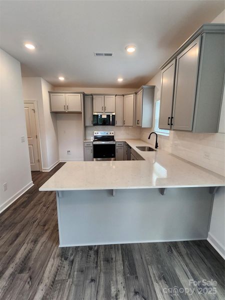 Furnished interior view inside a new home in , Charlotte (Image 8).