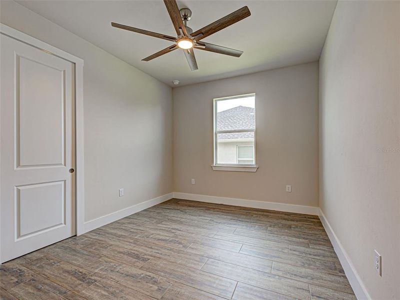 Spacious, unfurnished interior of a new home in , Port Charlotte (Image 48).