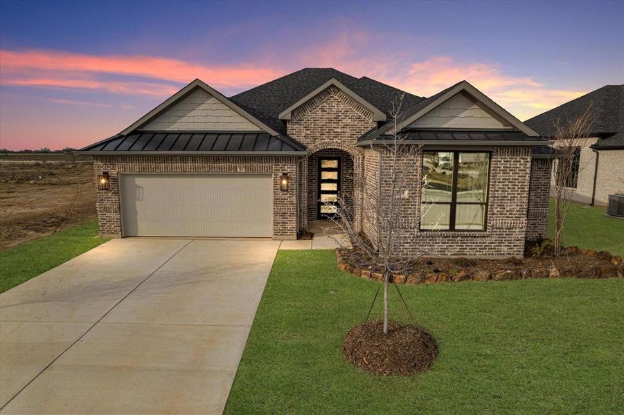 Front exterior of a new home in University Park at Northpointe, Denton, TX, highlighting curb appeal (Image 26).