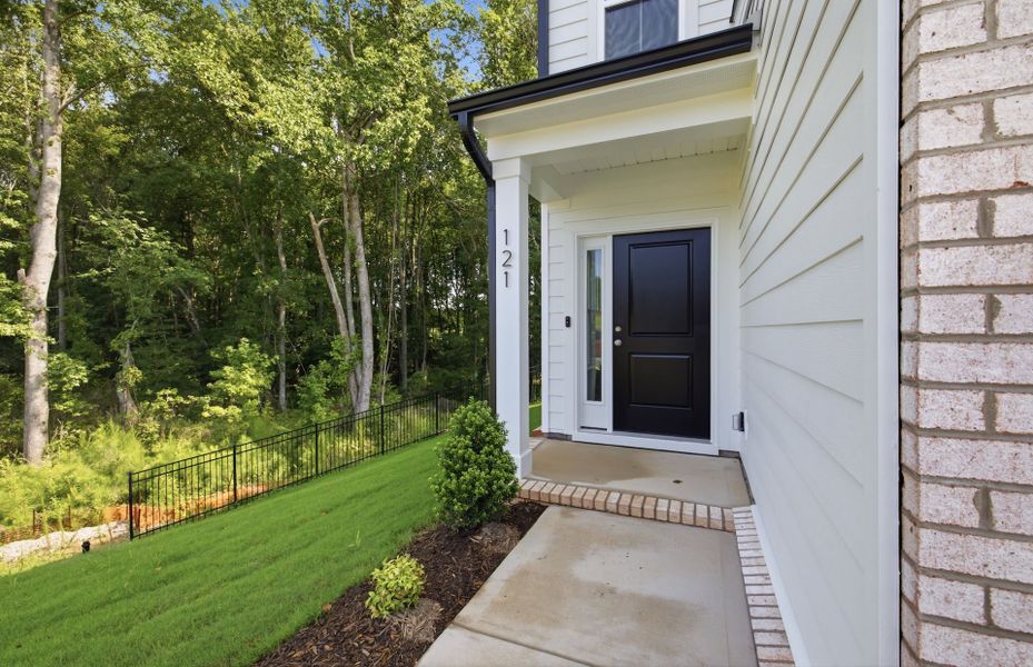 Exterior details and patio area of a home in Cambria, Garner (Image 4).