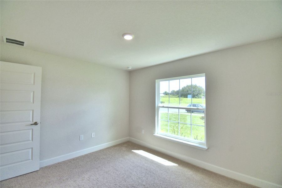 Spacious, unfurnished interior of a new home in Cadence Crossing, Auburndale (Image 31).