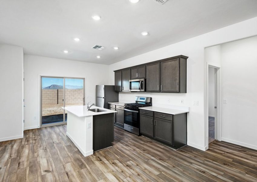 The kitchen has beautiful natural lighting.
